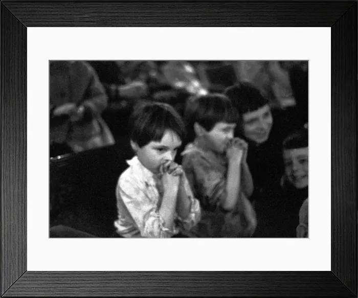 Framed Print : Children watching the pantomime Treasure Island at the Theatre Royal