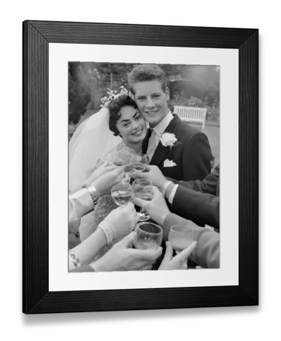 Framed Print : The happy couple Pamela and David Moore receive the toast at their reception Framed Print : The happy couple Pamela and David Moore receive the toast at their reception