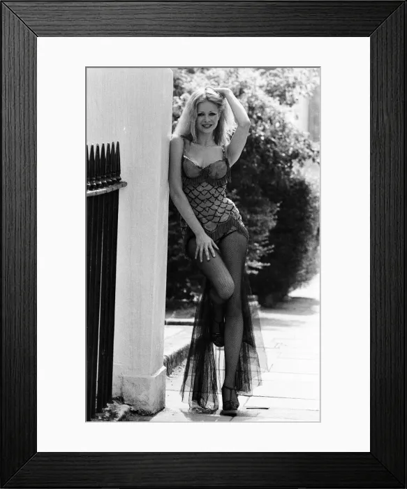 Framed Print : Model Jo Howard wearing the original costume worn by Marilyn Monroe in the film Framed Print : Model Jo Howard wearing the original costume worn by Marilyn Monroe in the film