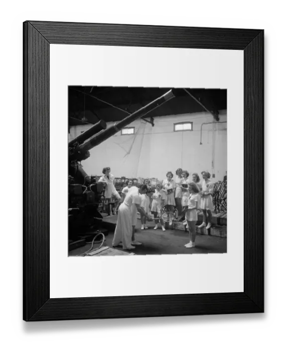 Framed Print : British tennis star Fred Perry demonstrates to members of the Yarrow Youth Club in