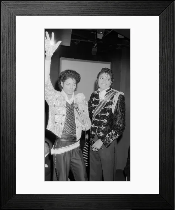 Framed Print : Singer Michael Jackson looking at a waxwork model of himself on display at madame Framed Print : Singer Michael Jackson looking at a waxwork model of himself on display at madame