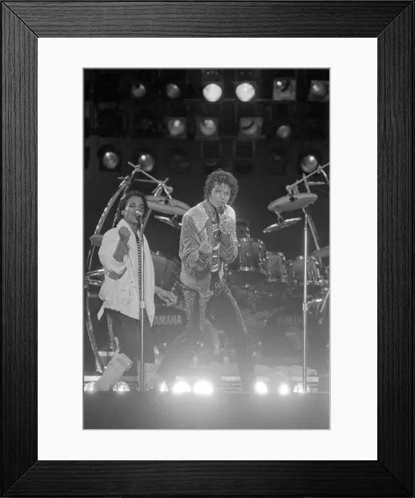 Framed Print : Singer Michael Jackson performing in concert in the USA. 12th July 1984 Framed Print : Singer Michael Jackson performing in concert in the USA. 12th July 1984