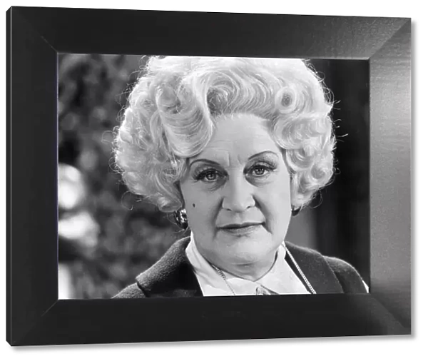 Mrs Slocombe (Actress Molly Sugden) seen here on the set of the film of the tv series