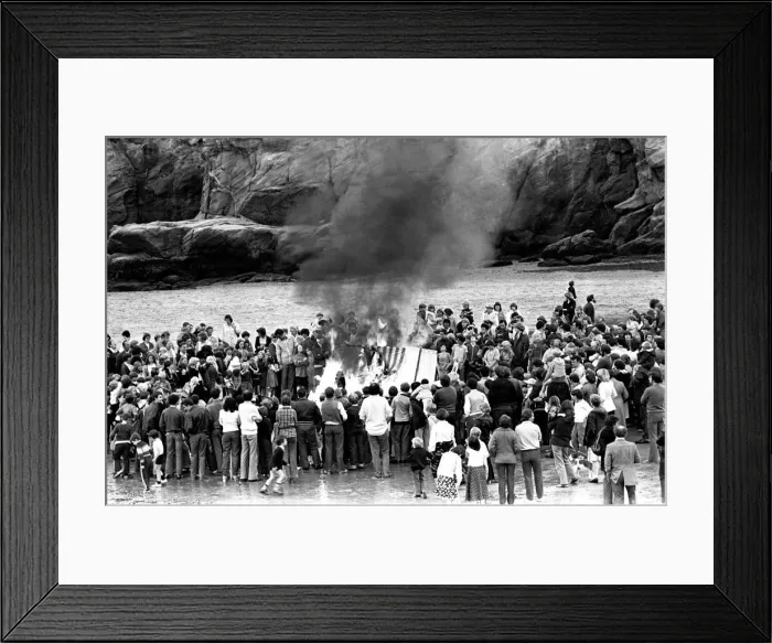 Framed Print : Models of Viking longships are burnt on the beach at Cullercoats Bay in July 1980