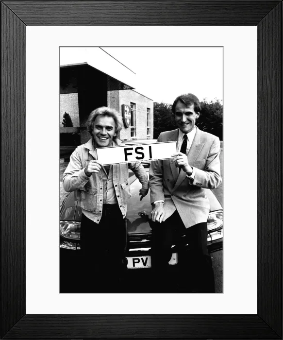 Framed Print : Comedian Freddie Starr receives the plates for his new car, a Jaguar XJS HE