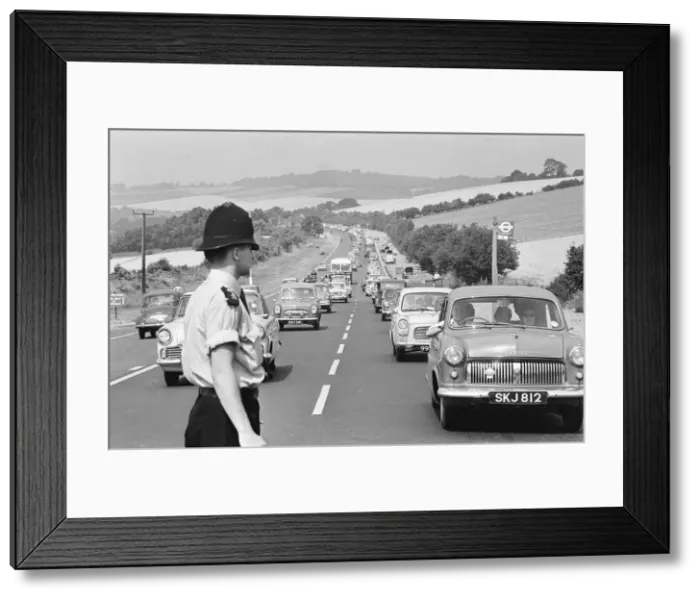 Framed Print : Policeman directing August Bank Holiday taffic on the A20 Framed Print : Policeman directing August Bank Holiday taffic on the A20