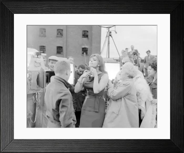 Framed Print : Sophia Loren seen here being made up before shooting a scene for the film Framed Print : Sophia Loren seen here being made up before shooting a scene for the film