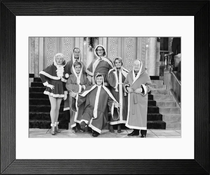 Framed Print : The cast of Are you being served pictured during the shooting of their