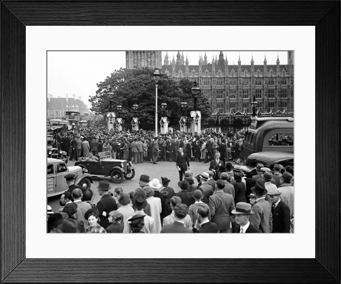 Framed Print : Large crowds gather outside the Houses of Parliment for news following Germany