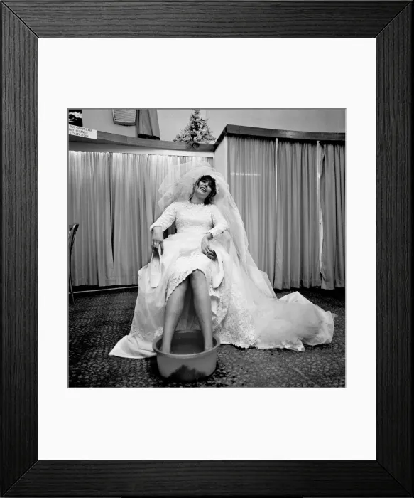 Framed Print : The thing that every bride must long to do at the end of her greatest, happiest Framed Print : The thing that every bride must long to do at the end of her greatest, happiest