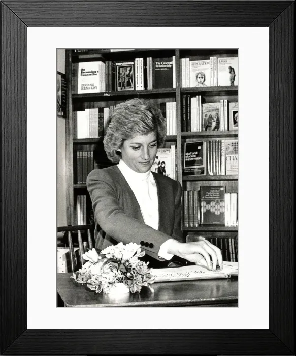 Framed Print : Diana, Princess of Wales during a visit to Rugby. She is seen here signing the RELATE Framed Print : Diana, Princess of Wales during a visit to Rugby. She is seen here signing the RELATE
