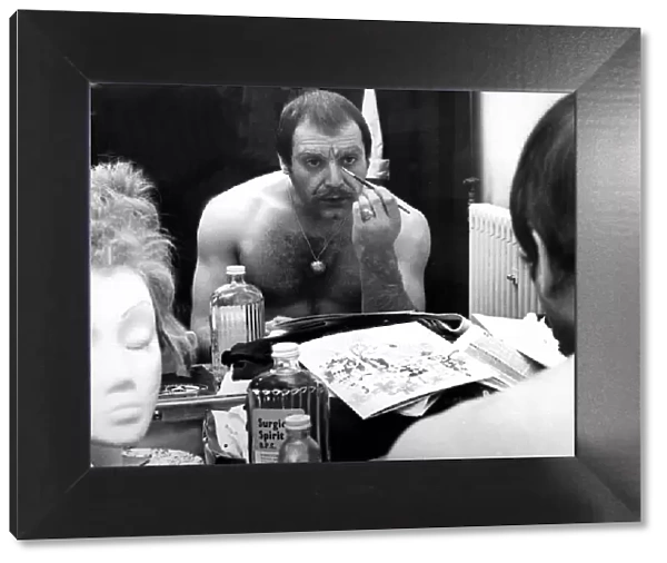 Actor David Suchet(26) is seen here in his dressing room applying his stage make-up for