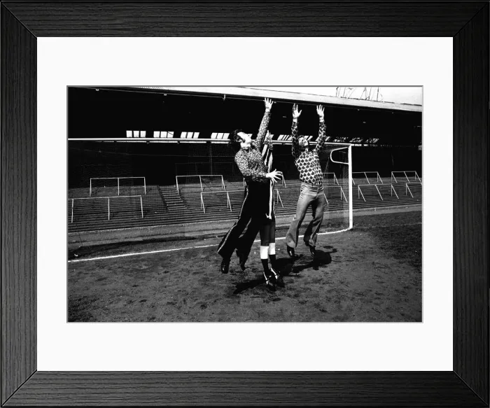Framed Print : Footballer Malcolm MacDonald models clothes for sale from his new Newcastle Boutique