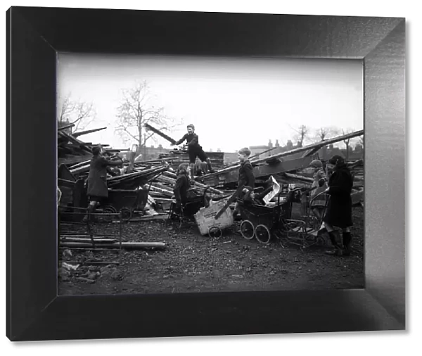 Children collecting firewood from bombed building september 1941 OP136 W376A box 46 y2k
