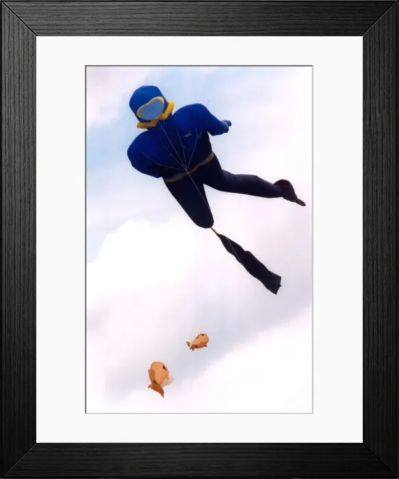 Framed Print : A participant in the annual kite festival at Washington in July 1996 Framed Print : A participant in the annual kite festival at Washington in July 1996