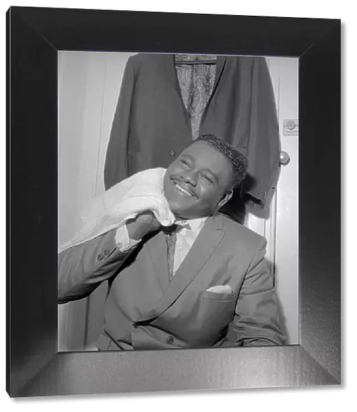 American rock and roll star Fats Domino in the dressing room after preparing for