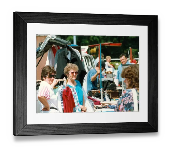 Framed Print : Stall holders wait for customes at the Blaydon Car Boot Sale in June 1993