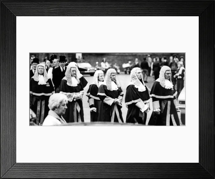 Framed Print : Solemn faced judges wind their way from Durham Castle to the Cathedral in the annual