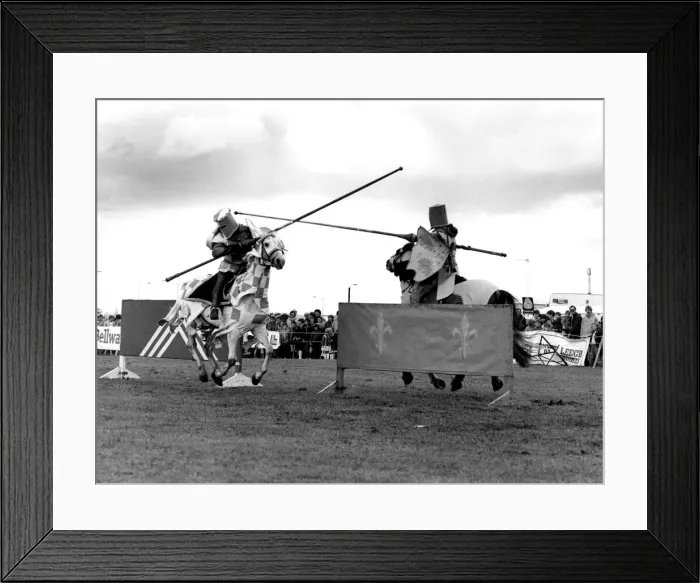 Framed Print : Knights on horseback clash at a jousting tournament in June 1984 Framed Print : Knights on horseback clash at a jousting tournament in June 1984