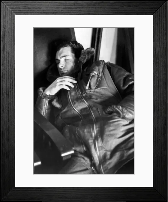 Framed Print : A pilot of the Royal Air Force catched up on some sleep between missions during