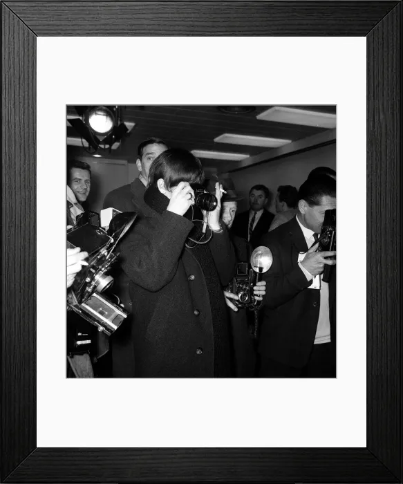 Framed Print : The Beatles Leaving for New York. Ringo Starr taking pictures of Paul McCartney along Framed Print : The Beatles Leaving for New York. Ringo Starr taking pictures of Paul McCartney along