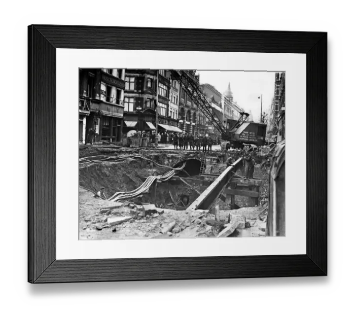Framed Print : Bomb damage being repaired on The Charing Cross Road, near Manette St, London
