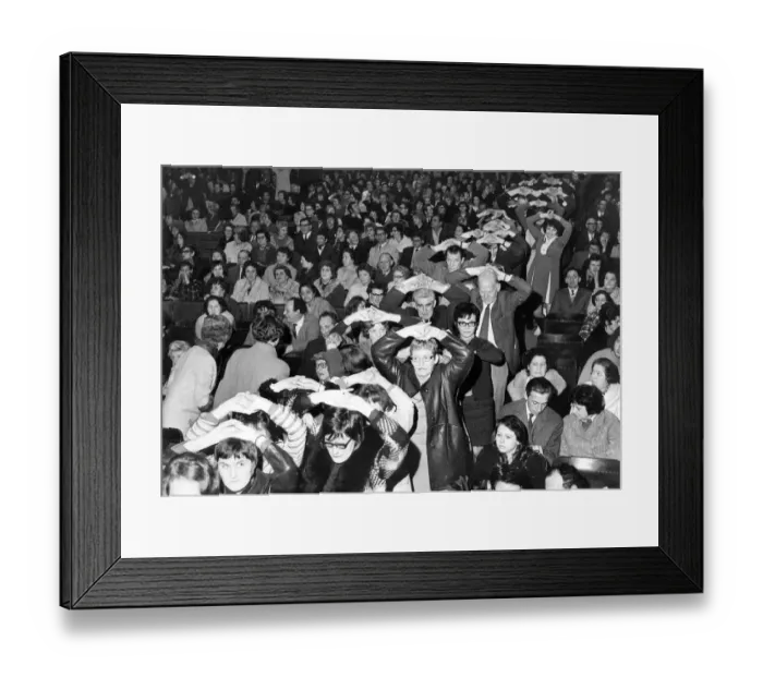 Framed Print : The audience line up to get on stage so Romark the hypnotist can help them to give up Framed Print : The audience line up to get on stage so Romark the hypnotist can help them to give up