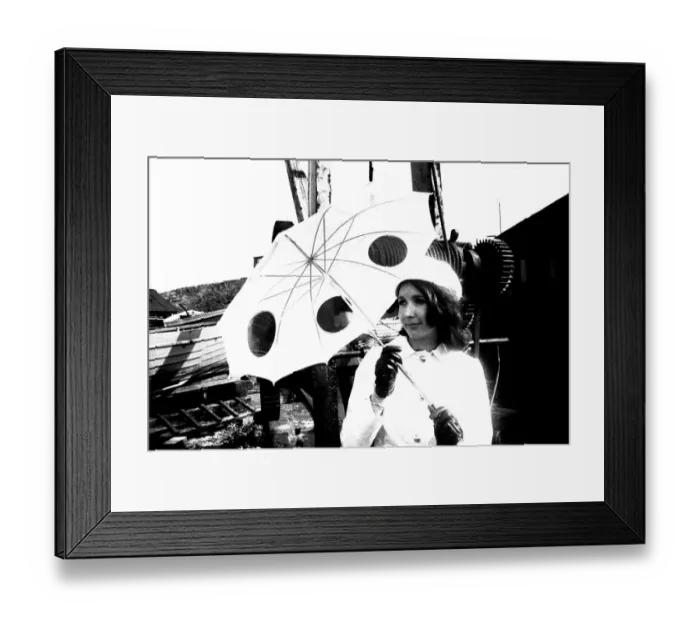 Framed Print : A model posing with and unbrella in April 1970 Framed Print : A model posing with and unbrella in April 1970
