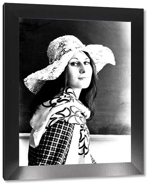 A model posing with a floppy hat in April 1971
