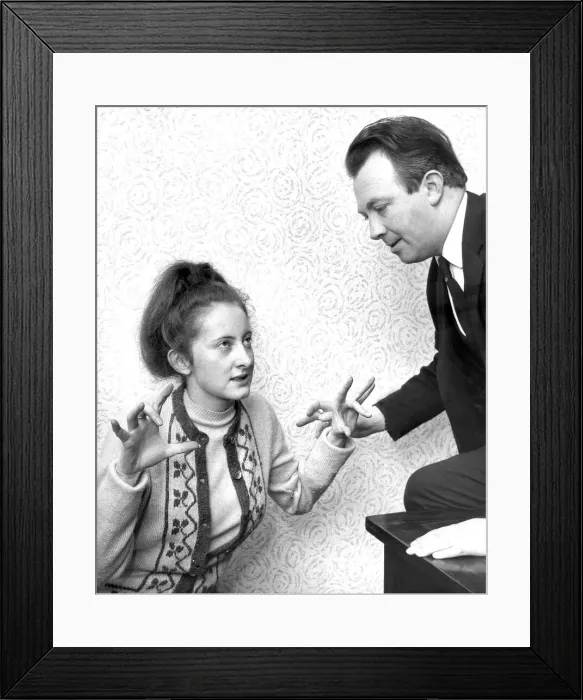 Framed Print : Captain Harold Dodds an amateur hypnotist with his 21 year old assistant Irene Wilson who