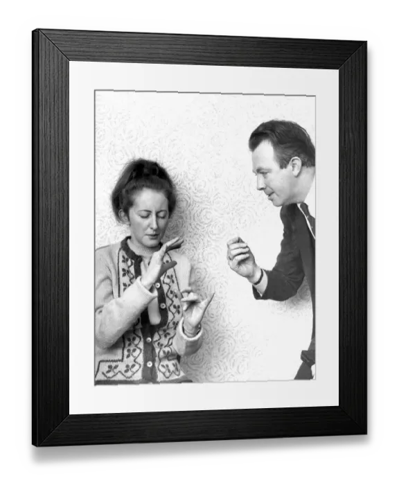 Framed Print : Captain Harold Dodds an amateur hypnotist with his 21 year old assistant Irene Wilson who Framed Print : Captain Harold Dodds an amateur hypnotist with his 21 year old assistant Irene Wilson who