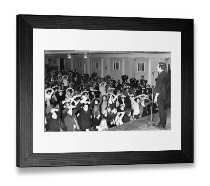 Framed Print : Romark the hypnotist on stage looking for volunteers at the City Hall Framed Print : Romark the hypnotist on stage looking for volunteers at the City Hall
