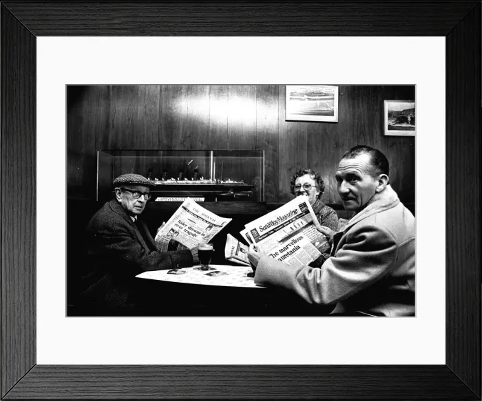 Framed Print : Three regulars at the Mauretania Pub in Wallsend, reading a copy of the Newcastle Journal Framed Print : Three regulars at the Mauretania Pub in Wallsend, reading a copy of the Newcastle Journal