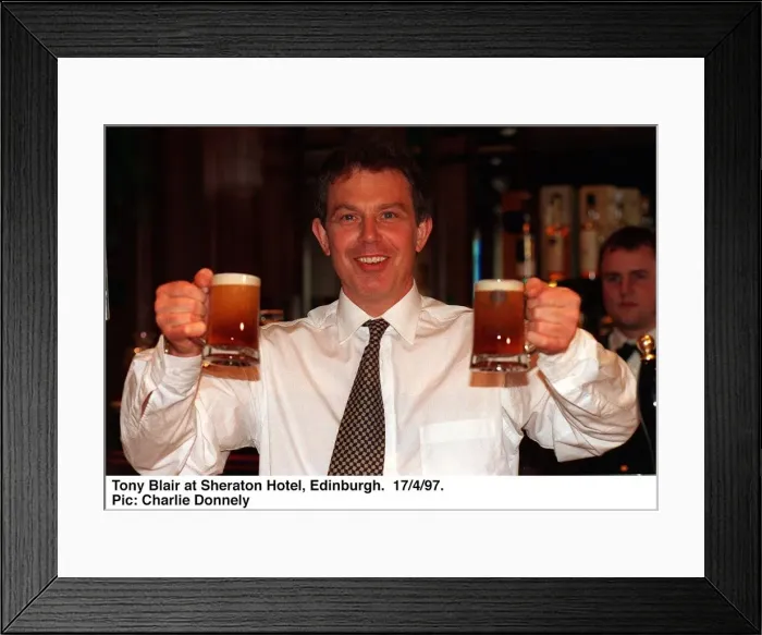 Framed Print : Tony Blair holding two half pints of Blairs Brew beer in both hands. April 1997 Framed Print : Tony Blair holding two half pints of Blairs Brew beer in both hands. April 1997