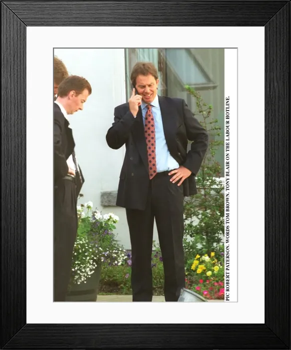 Framed Print : Tony Blair MP Labour Leader in a garden speaking into a mobile phone Framed Print : Tony Blair MP Labour Leader in a garden speaking into a mobile phone