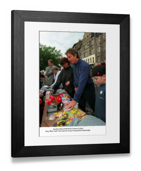 Framed Print : Prime Minister Tony Blair August 1998 with his wife Cherie in the Grassmarket