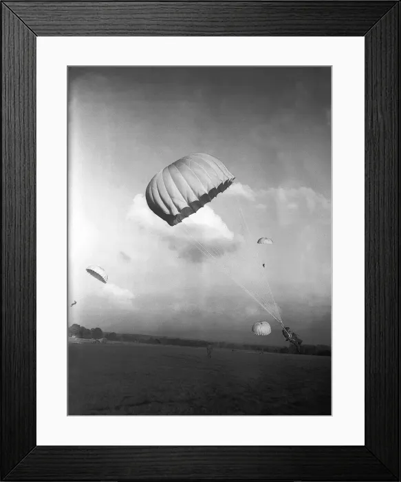 Framed Print : Parachutists in descent and coming to land, during WW2 Framed Print : Parachutists in descent and coming to land, during WW2
