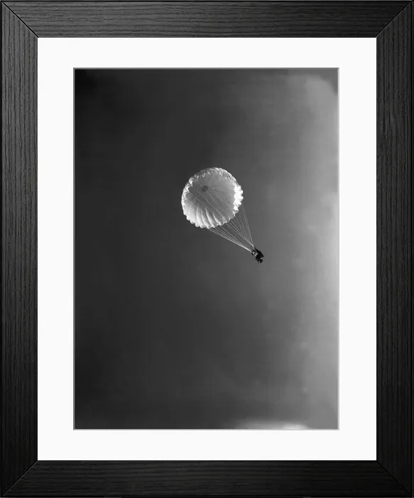 Framed Print : Paratrooper in descent during WW2. Circa 1942 Framed Print : Paratrooper in descent during WW2. Circa 1942
