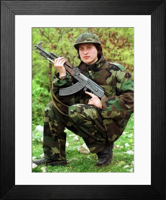 Framed Print : Luljeta Gashi of the Kosovo Liberation Army KLA April 1999 Female sodier crouching Framed Print : Luljeta Gashi of the Kosovo Liberation Army KLA April 1999 Female sodier crouching