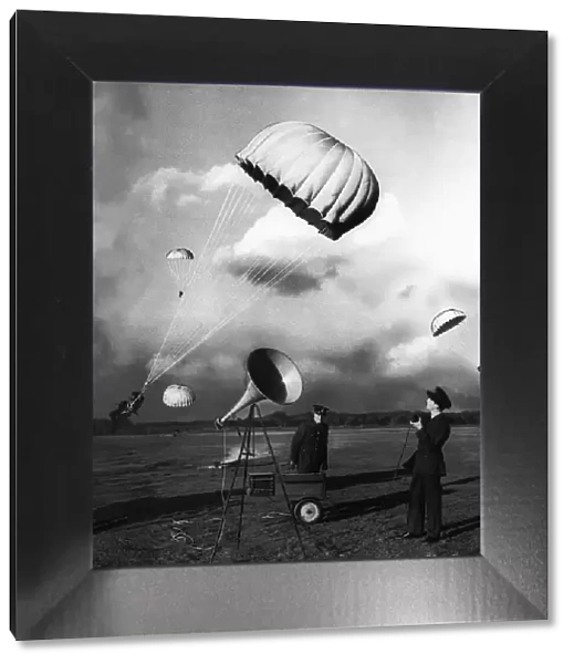 Parachutists in descent during WW2. l Circa 1942