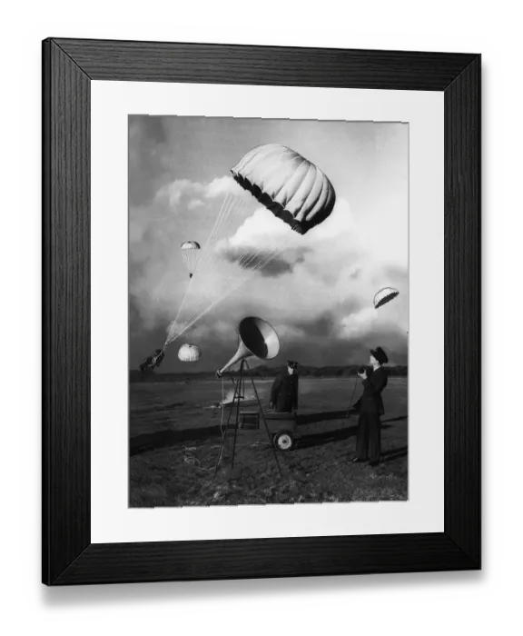 Framed Print : Parachutists in descent during WW2. l Circa 1942