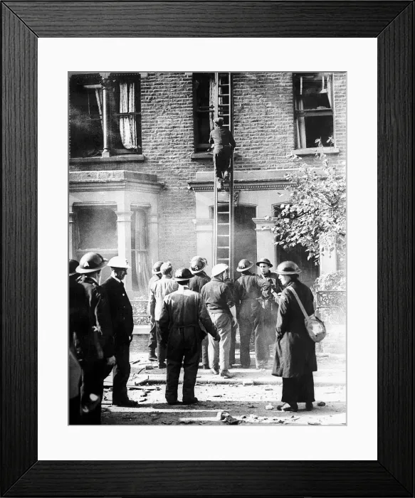 Framed Print : Rescue workers at scene of bomb damaged house during WW2