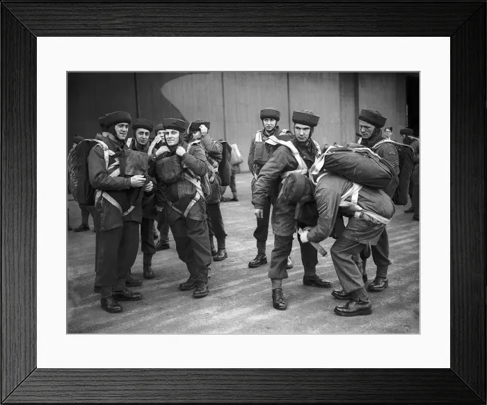 Framed Print : Parachutists during WW2, being kitted up for military exercise. Circa 1942
