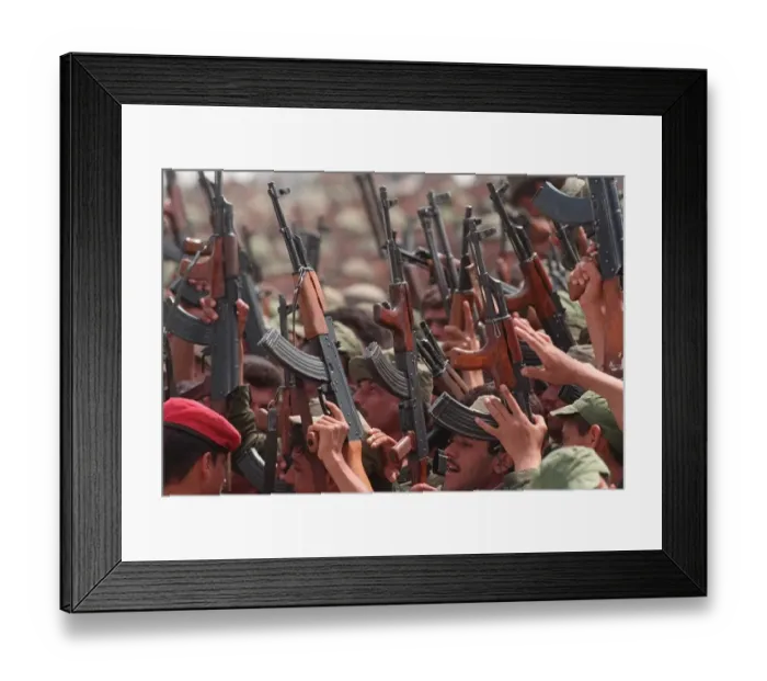 Framed Print : Volunteer Reserve Army in Iraq May 1998 crowds of soldiers with guns raised Framed Print : Volunteer Reserve Army in Iraq May 1998 crowds of soldiers with guns raised