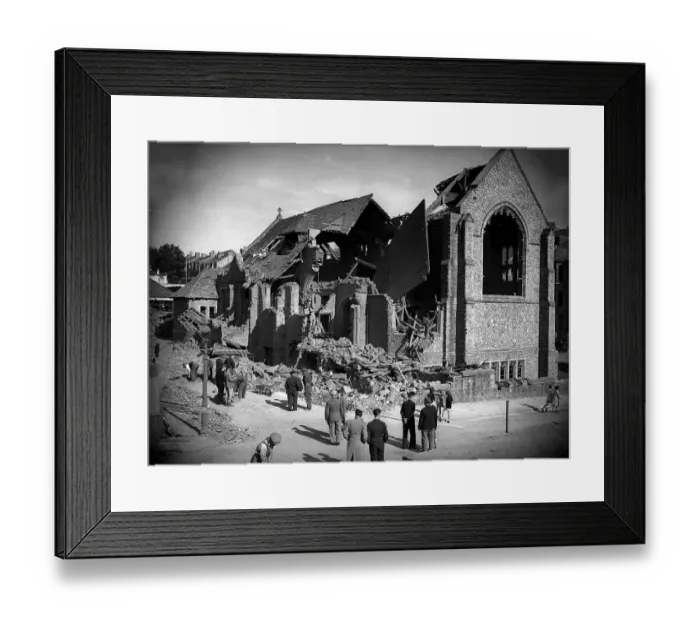 Framed Print : Bomb damaged Plymouth during WW2, People survey the damage left after an air raid Framed Print : Bomb damaged Plymouth during WW2, People survey the damage left after an air raid
