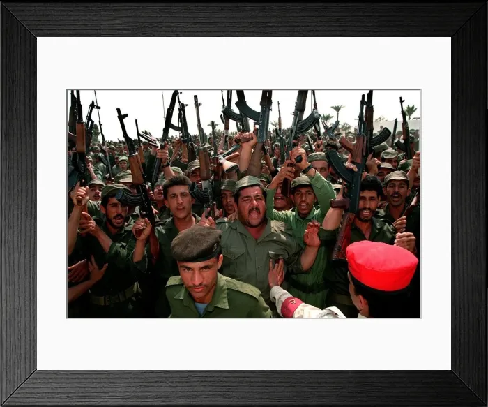 Framed Print : Volunteer Reserve Army Parade in Tikrit Iraq May 1998 a crowd of soldiers cheering