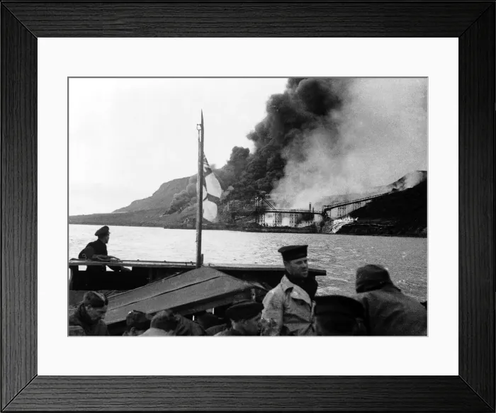 Framed Print : WW2 Allied troops watch from a ship as a German fuel dump of coal & oil burns out of Framed Print : WW2 Allied troops watch from a ship as a German fuel dump of coal & oil burns out of