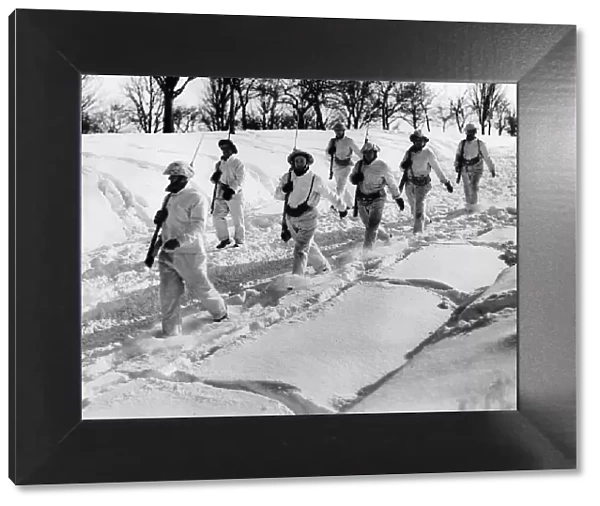 WW2 Arctic conditions on the Western Front - British troops wearing white suit