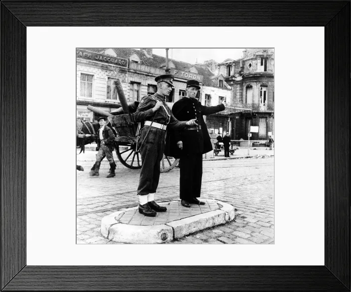 Framed Print : French policeman talks to an army soldier in the centre of Calais France Framed Print : French policeman talks to an army soldier in the centre of Calais France