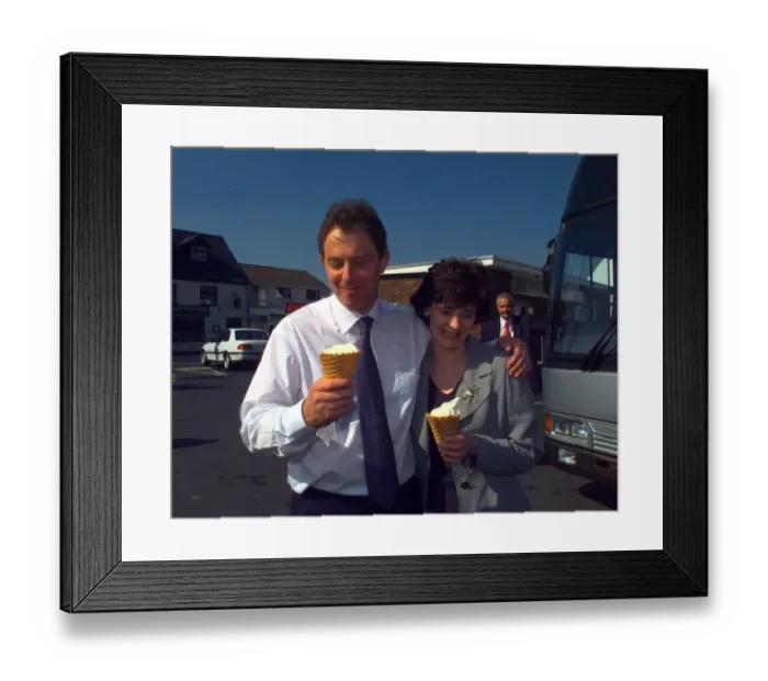 Framed Print : Tony and Cherie Blair enjoy ice cream on a hot sunny day in Monmouth during the April
